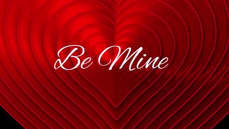 Be-mine-text-with-hearts-appearing-on-black-background