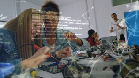 Females-engineering-students-working-with-data-processing-and-network-of-connections-moving