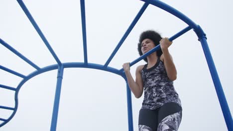 Mixed-race-woman-working-out-outside