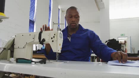 Worker-sewing-a-tissue