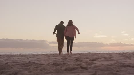 Active-senior-couple-on-beach