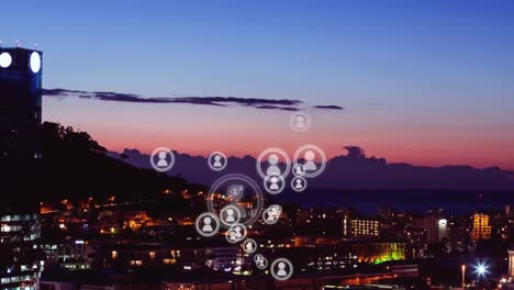 Animation-of-people-icons-with-city-in-background