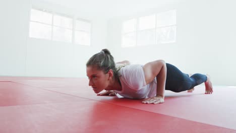 Caucasian-woman-doing-push-ups