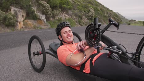 Disabled-man-on-a-recumbent-bicycle
