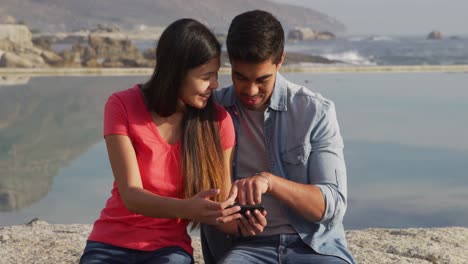 Young-couple-looking-at-the-phone
