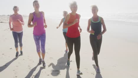 Senior-women-running-on-the-beach