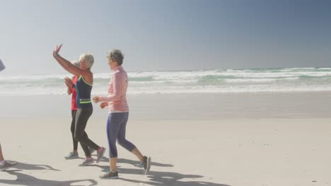 Athletic-women-having-fun-on-the-beach