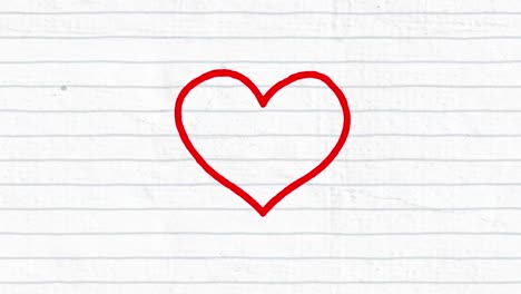 Animation-of-red-heart-hand-drawn-with-a-marker-on-white-lined-paper