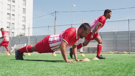 Soccer-players-training-on-field