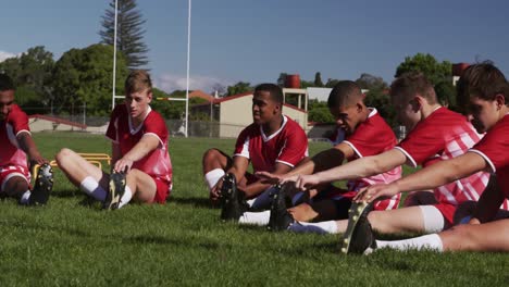 Rugby-players-stretching-on-the-field