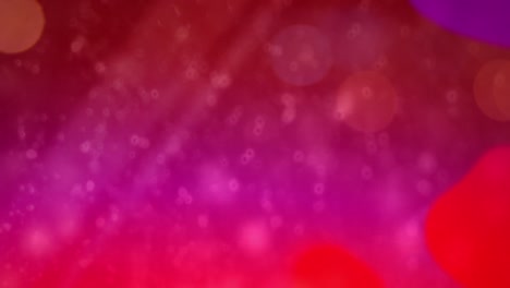 Animation-of-multiple-out-of-focus-pink-and-purple-liquid-splodges-and-white-particles