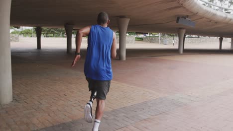 Rear-view-man-with-prosthetic-leg-running