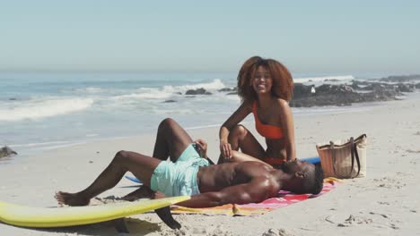 African-American-couple-enjoying-at-beach