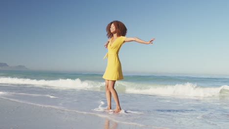 African-American-woman-enjoying-seaside
