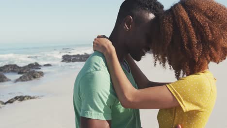 African-American-couple-dancing-seaside