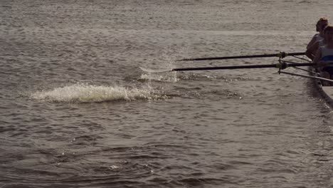Male-rower-team-practicing-rowing-on-the-lake