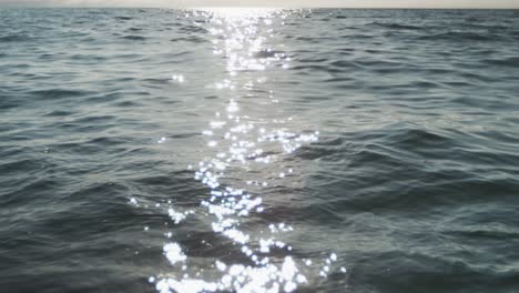 Close-up-detail-of-sunshine-reflecting-in-water