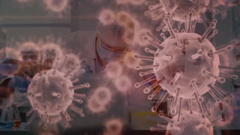 Animation-Der-Ausbreitung-Des-Coronavirus-Covid19-Mit-Medizinischem-Personal-Im-Hintergrund