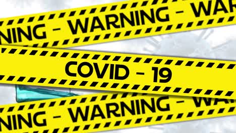 Words-Warning-Covid-19-written-in-black-letters-on-yellow-and-black-tape-with-Covid-19-spreading-