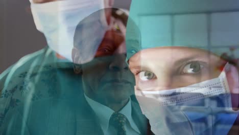 Animation-of-doctors-wearing-coronavirus-covid19-masks-in-a-hospital-with-worried-senior-male-patien