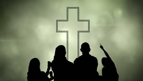 Animation-of-silhouette-of-Christian-cross-and-a-family-over-glowing-green-clouds-