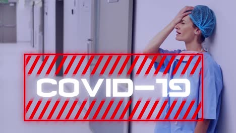 Animation-Des-Wortes-„Covid19“-Mit-Gesundheitspersonal-Im-Hintergrund
