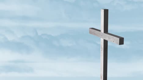 Animation-of-silhouette-of-wooden-Christian-cross-over-blue-clouds-moving-in-background