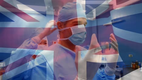 Animation-of-UK-flag-with-healthcare-worker-in-background-during-coronavirus-pandemic