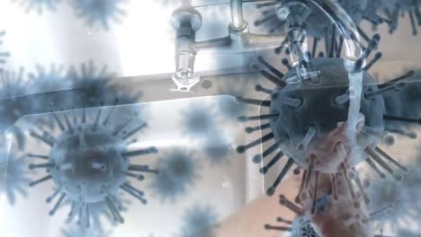 Animation-Von-Makro-Coronavirus-Covid-19-Zellen,-Die-Sich-über-Einen-Mann-Ausbreiten,-Der-Seine-Hände-Wäscht