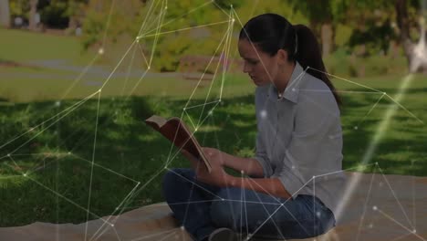 Animation-of-network-of-connections-over-female-student-reading-a-book-learning-from-home