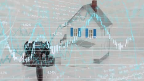 Animation-of-house-over-stock-market-display-in-the-background