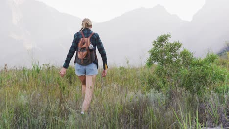 Caucasian-woman-hiking-in-nature