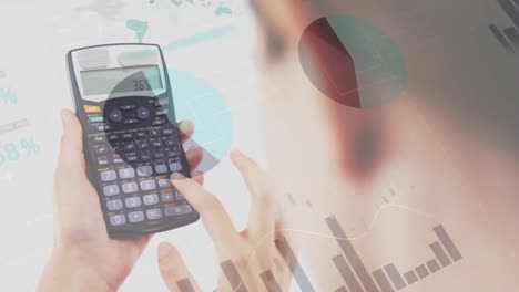 Financial-data-processing-against-woman-using-calculator