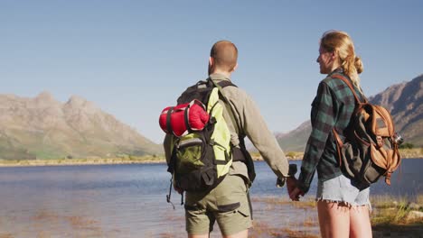 Caucasian-couple-hiking-in-nature