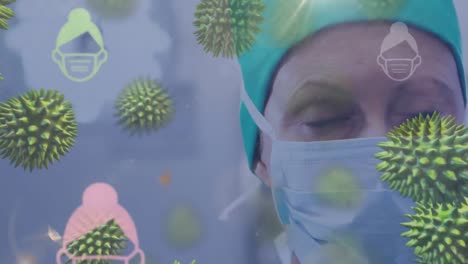 Animation-Von-Covid-19-Makrozellen-über-Einem-Chirurgen-Mit-Schutzmaske-Und-Symbolen