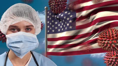 Animation-of-COVID-19-macro-cells-over-a-surgeon-with-a-protective-mask-and-the-USA-flag