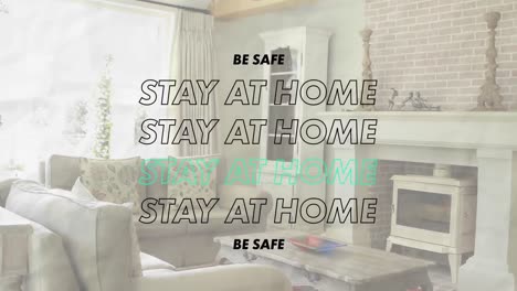 Animation-of-words-Be-Safe-Stay-At-Home-flashing-over-an-empty-living-room