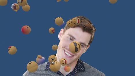 Animation-of-a-Caucasian-man-looking-at-floating-emojis