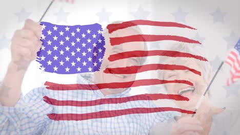 Animation-Der-US-Flagge,-Die-über-Ein-älteres-Kaukasisches-Paar-Zieht,-Das-Mini-US-Flaggen-Hält-Und-Schwenkt