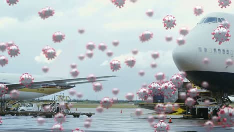 Animation-Von-Makro-Covid-19-Zellen,-Die-über-Flugzeugen-Schweben,-Die-Auf-Einem-Flughafen-Stehen