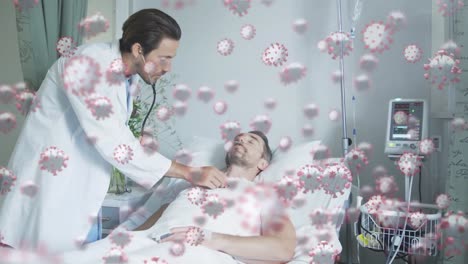 Animation-of-macro-Covid-19-cells-floating-over-Caucasian-doctor-examining-a-patient