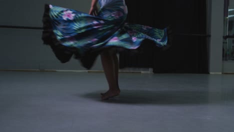Mixed-race-female-dancer-spinning-