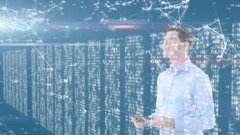 Animation-of-Caucasian-man-using-digital-tablet-and-looking-at-floating-data-with-processing-servers
