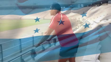 Animation-Einer-Honduranischen-Flagge,-Die-über-Einem-Afroamerikanischen-Mann-Weht,-Der-In-Einem-Leeren-Stadion-Steht