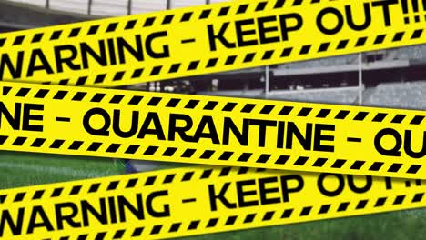 Animation-of-black-and-yellow-tapes-with-words-Warning-Keep-Out-Quarantine-over-rugby-ball-lying