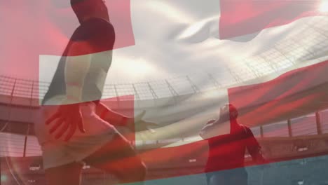Animation-of-Swiss-flag-waving-over-two-multi-ethnic-rugby-teams-playing-rugby