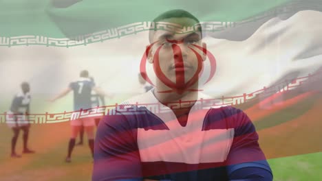 Animación-De-La-Bandera-Iraní-Ondeando-Sobre-Un-Jugador-De-Rugby-De-Raza-Mixta.