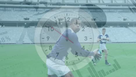 Animation-of-clock-ticking,-graphs-rolling-over-two-multi-ethnic-rugby-teams-playing-rugby