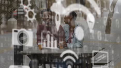 Web-of-connections-icons-against-couple-having-coffee