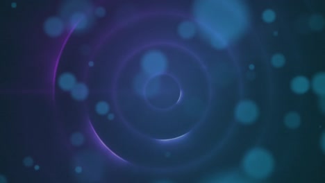Digitally-generated-video-of-glowing-spots-moving-over-circles-against-blue-background